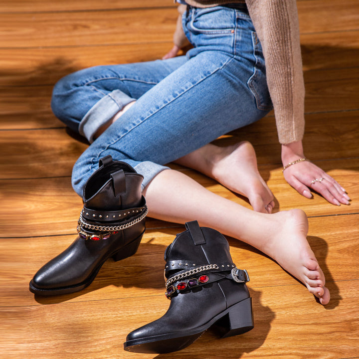 Stylish black leather studded boots for women