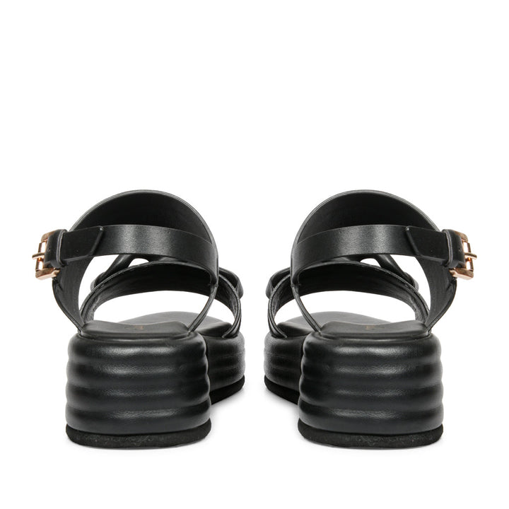 Stylish Saint Flurina Black Leather Sandals - Elevate your look with woven leather and platform sole. Perfect for any occasion.