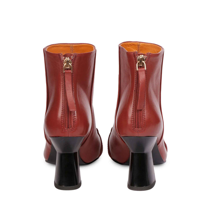 Women's leather boots with gold décor