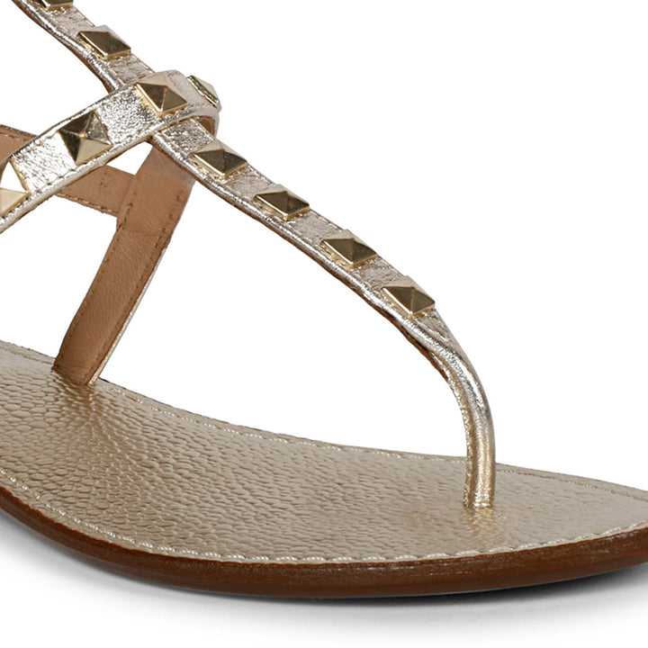 Chic Saint Irene Platin Leather Sandals with Metal Studs - Stylish and comfortable flat sandals for a fashion-forward look