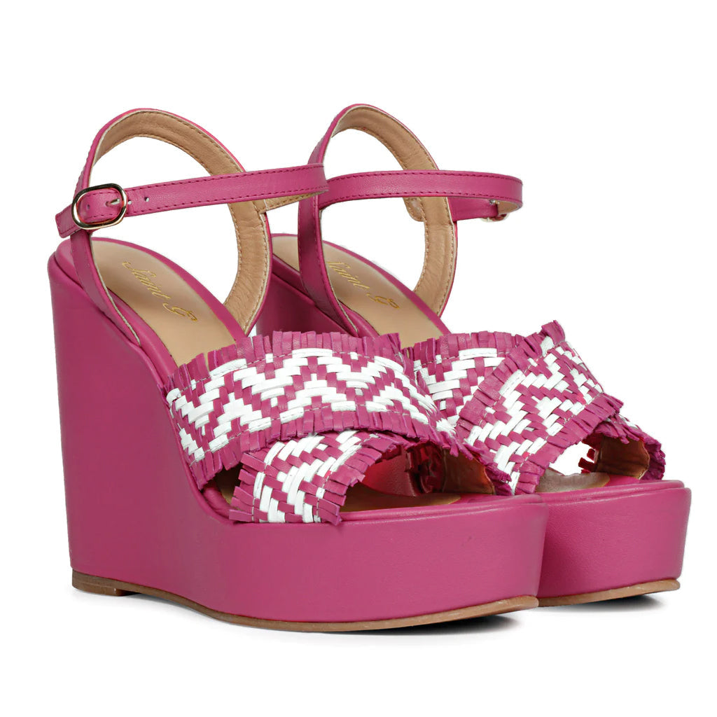 Elevate your look with Saint Glenda's handwoven hot pink wedge heels