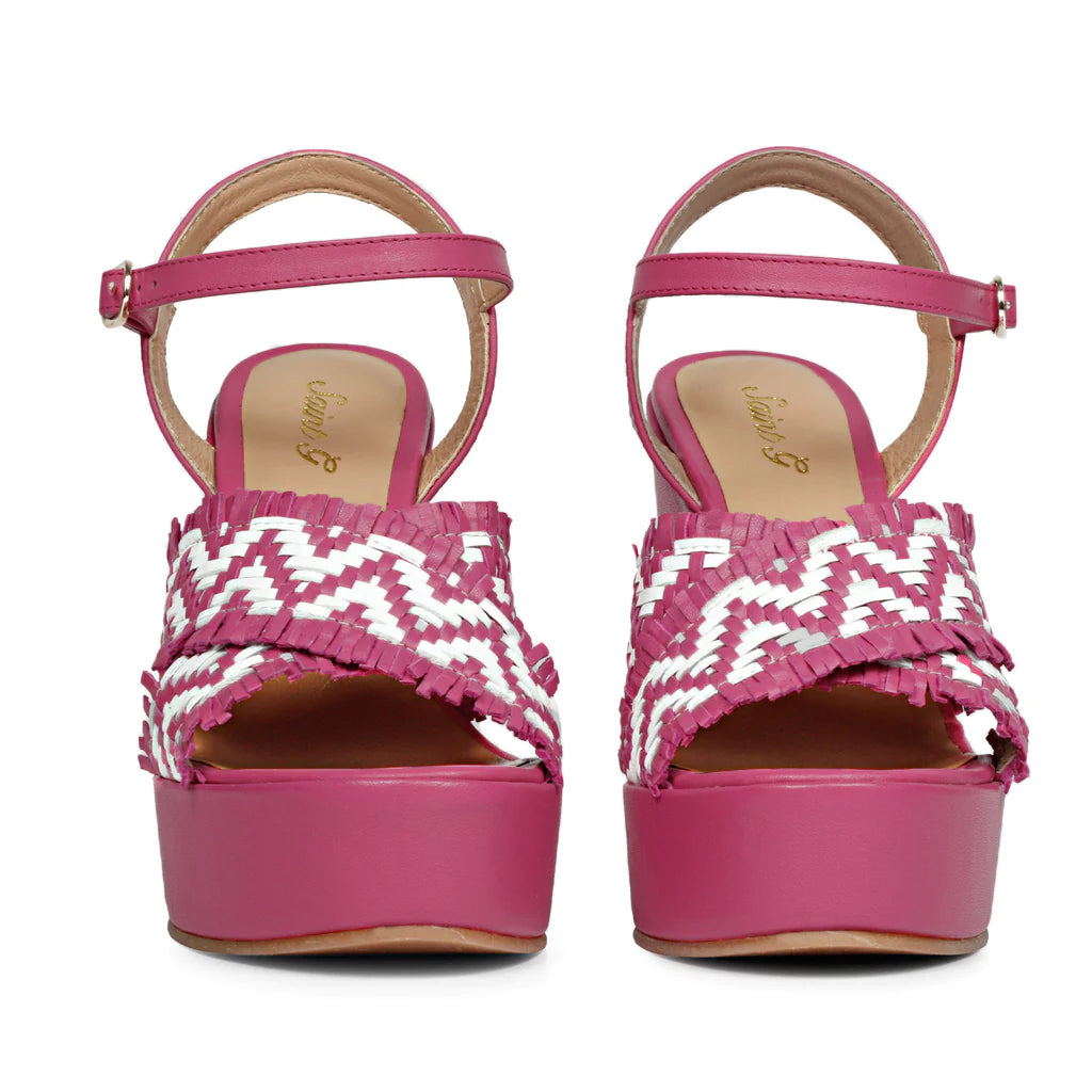 Elevate your look with Saint Glenda's handwoven hot pink wedge heels