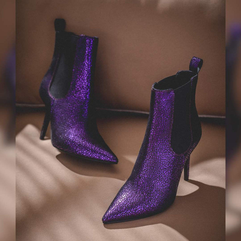 Purple leather kitten heel boots with a sleek and stylish design, perfect for adding a pop of color to your outfit