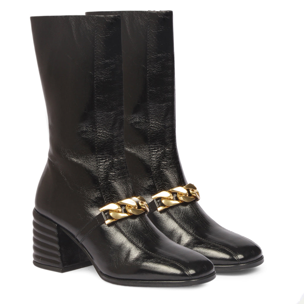 Sleek and stylish Saint Laoise black distressed leather high ankle boots for a bold and fashionable statement. Elevate your look with these chic boots.