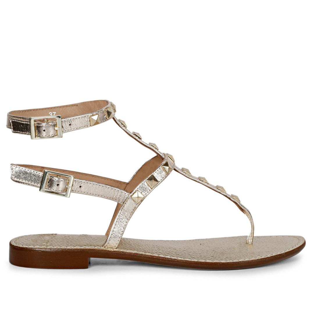 Chic Saint Irene Platin Leather Sandals with Metal Studs - Stylish and comfortable flat sandals for a fashion-forward look