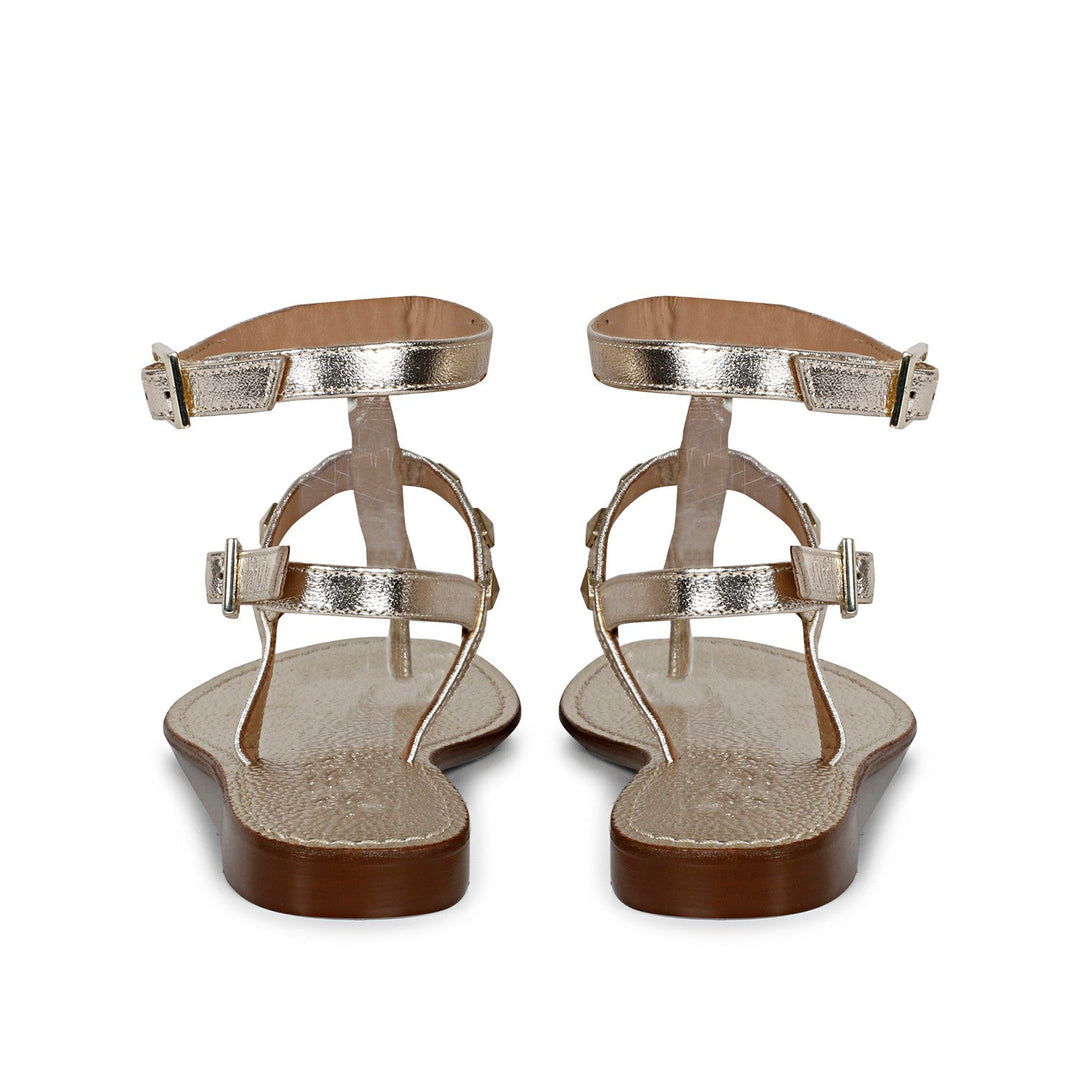 Chic Saint Irene Platin Leather Sandals with Metal Studs - Stylish and comfortable flat sandals for a fashion-forward look