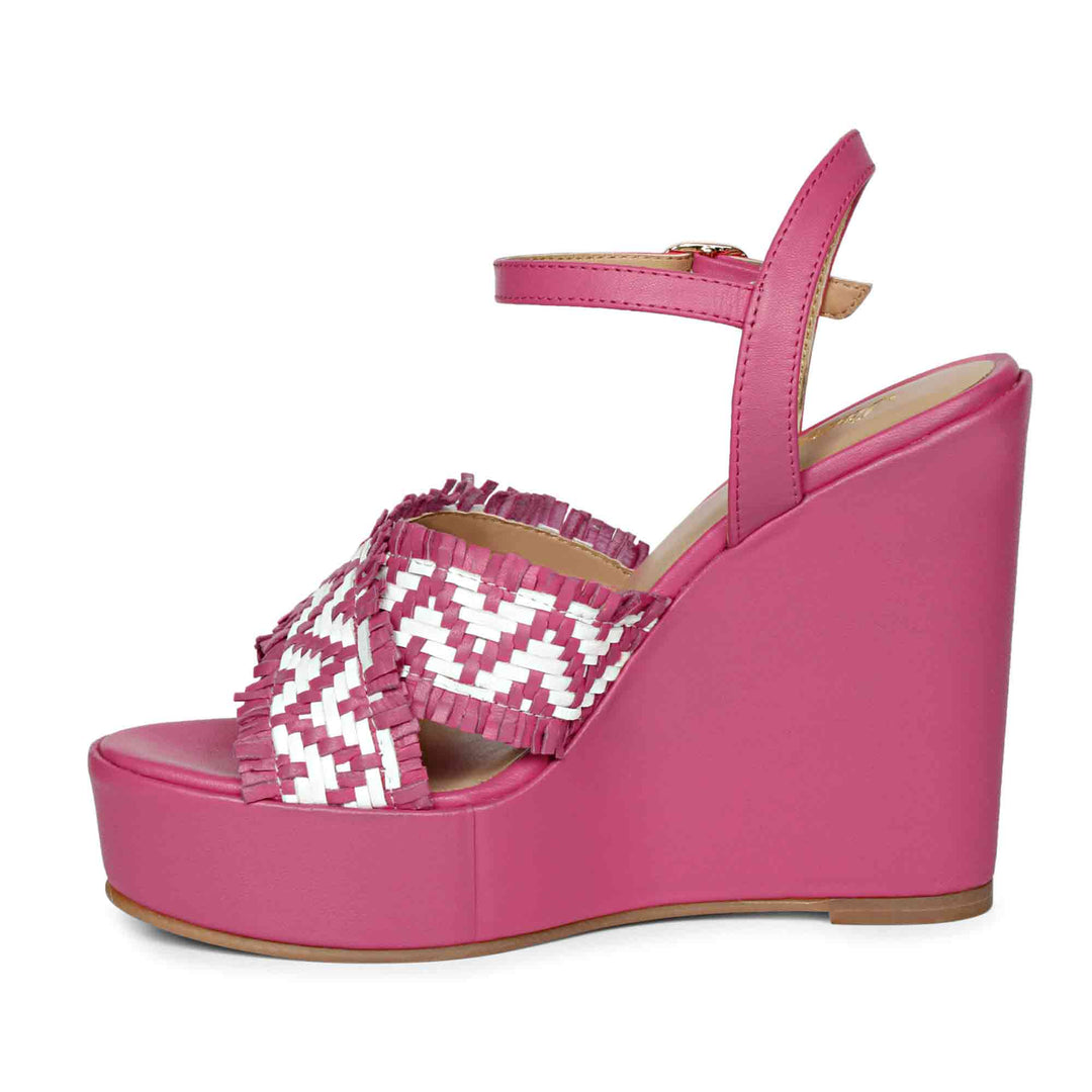 Elevate your look with Saint Glenda's handwoven hot pink wedge heels