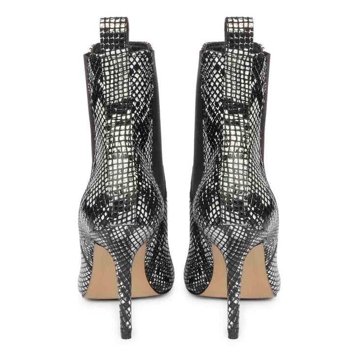 Chic snake print leather kitten heel boots for a stylish look. Perfect for any occasion. Elevate your style with these trendy boots