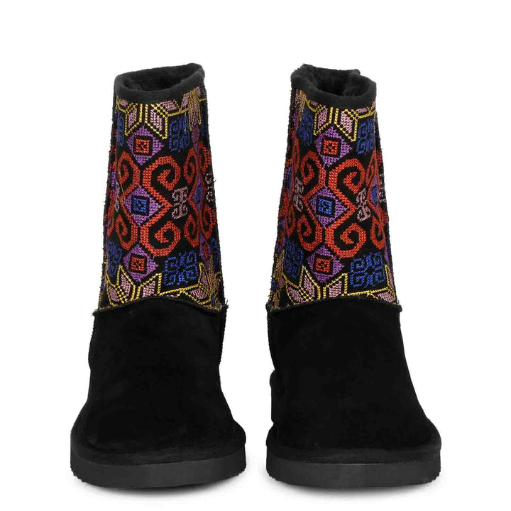 Luxurious Saint Elaine boots: Black suede, snug design, and exquisite embroidery