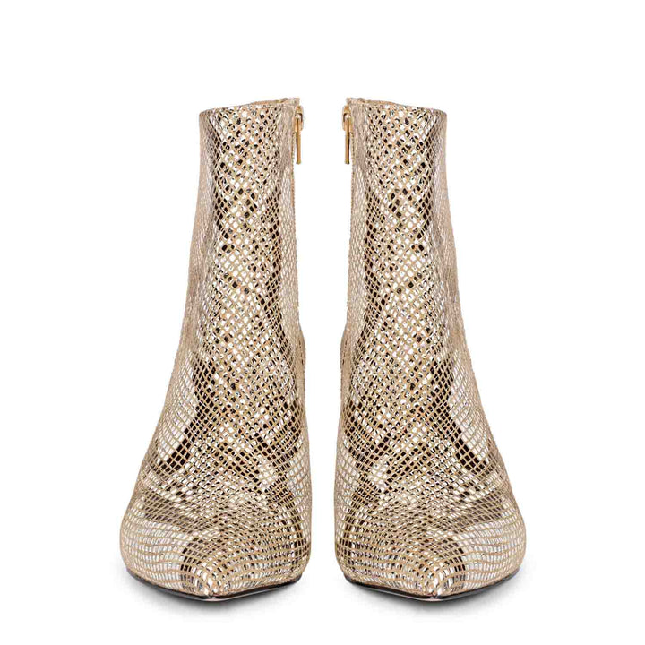 Trendy snake print ankle boots with kitten heels by Saint Lottie.