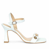 Saint Dahlia Gold Flower Eyelets Sky Leather Heels