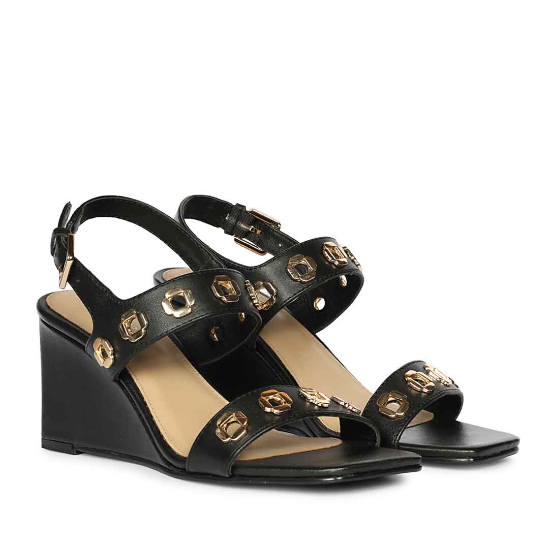 Saint Julien Flower Eyelets Black Leather Wedge Heels