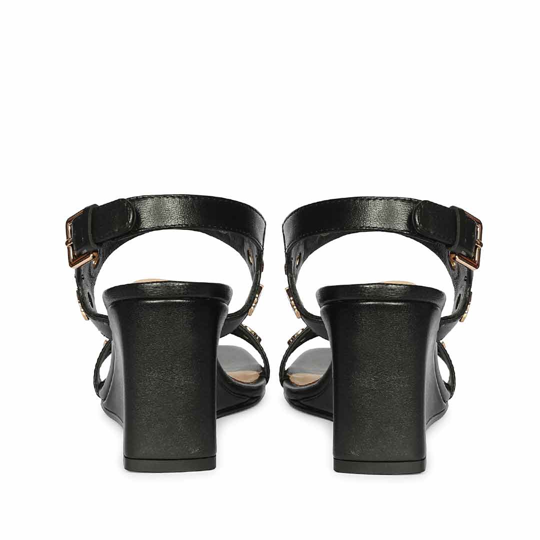 Saint Julien Flower Eyelets Black Leather Wedge Heels