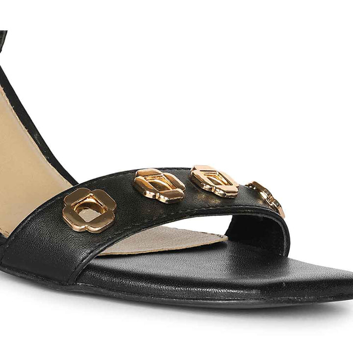 Saint Dahlia Gold Flower Eyelets Black Leather Heels