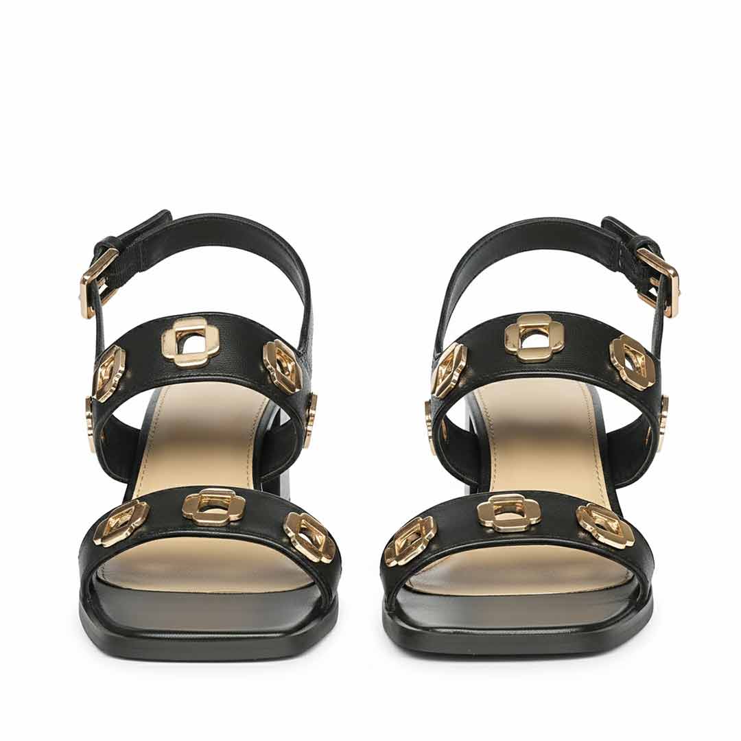 Saint Alviera Gold Flower Eyelets Black Leather Block Heels