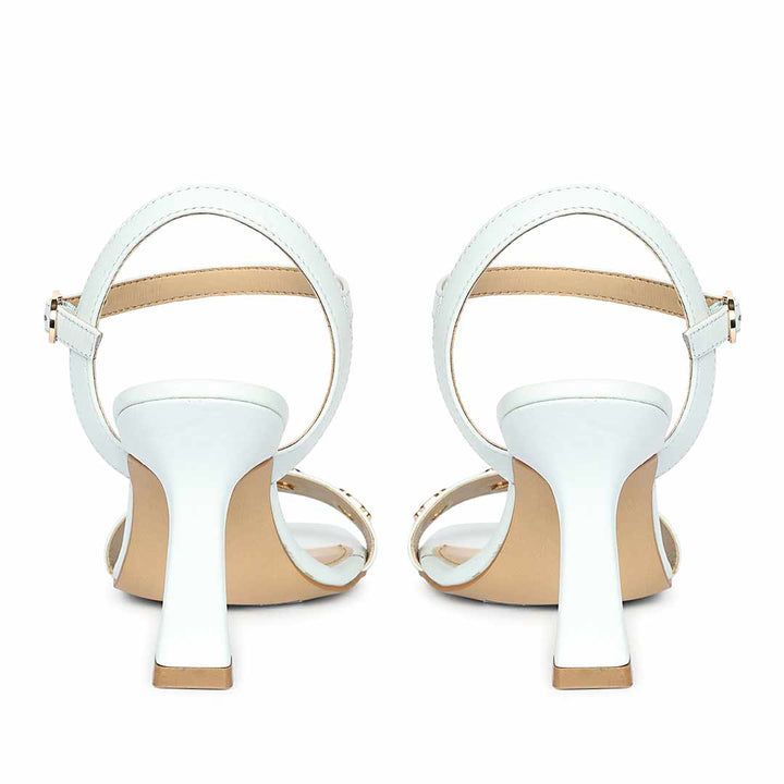 Saint Dahlia Gold Flower Eyelets Sky Leather Heels