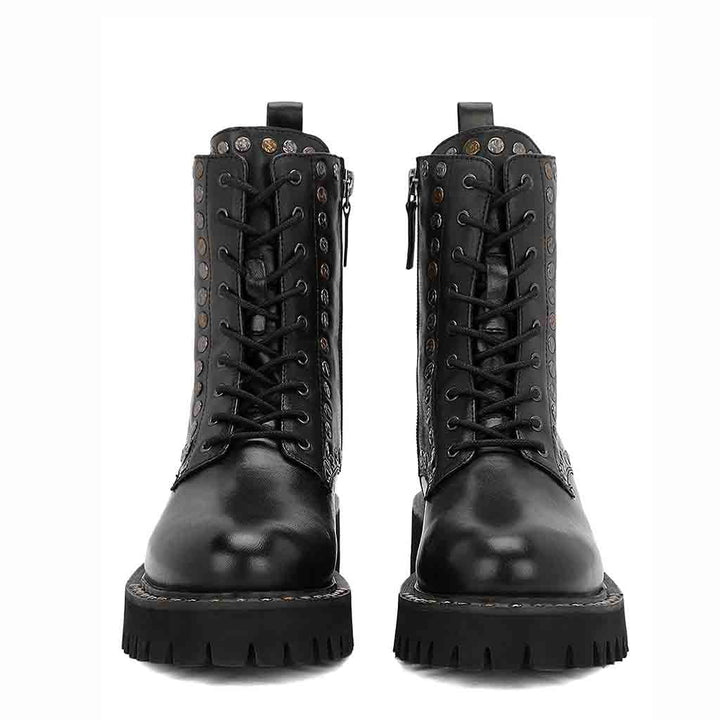 Sleek and edgy SAINT NATALIE boots with metal studs, lace-up design, and high ankle for a stylish look