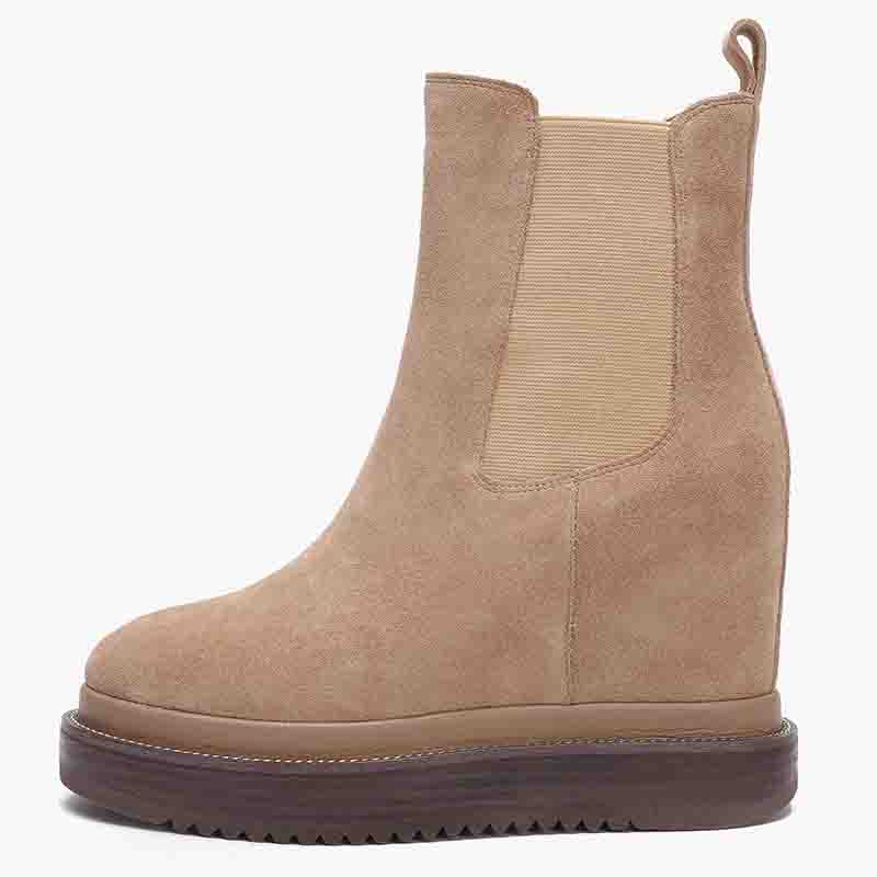 Saint Veronica Sabbia Suede Wedge Boots: Elevate your style with these chic ankle boots featuring a luxurious suede finish and comfortable wedge heel