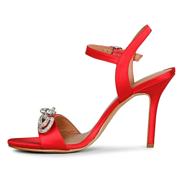 Chic red satin heels by Saint Hayden with crystal bow