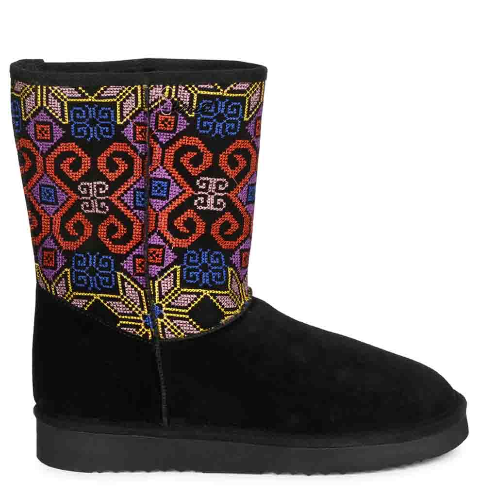 Luxurious Saint Elaine boots: Black suede, snug design, and exquisite embroidery