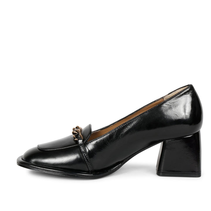 Step into luxury: Saint Mirielle's black patent leather moccasins - handcrafted perfection