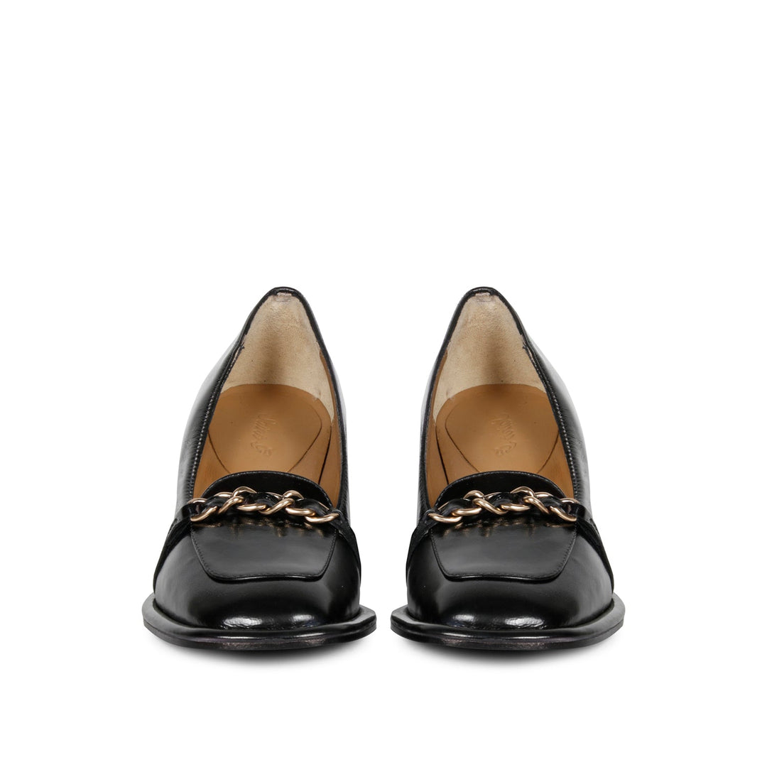 Step into luxury: Saint Mirielle's black patent leather moccasins - handcrafted perfection